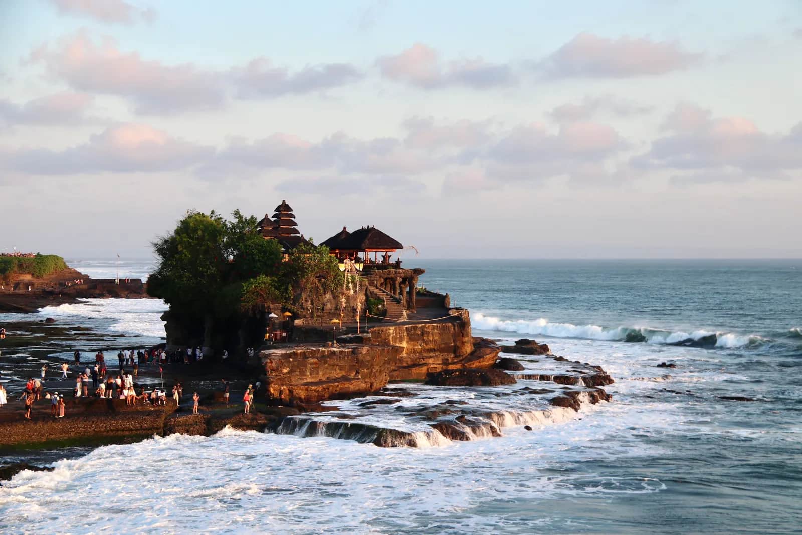 Tanah Lot temple on its rock above the surf at the end of the day, Bali